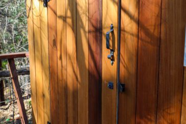 Treehouse door with Rainier Plank siding