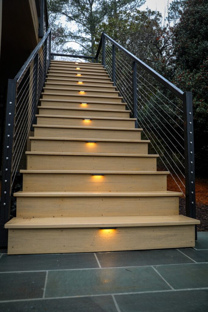 lake-windward-timbertech-deck-trespa-siding- Trespa Pura siding detail highlighting warm tone and modern finish.