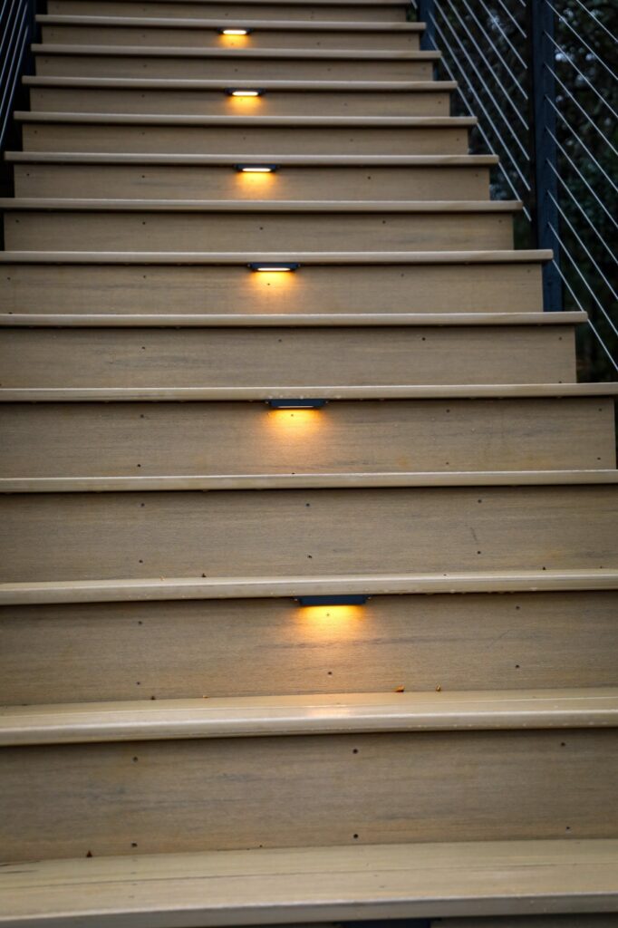 lake-windward-timbertech-deck-trespa-siding- Outdoor seating area on TimberTech deck overlooking Lake Windward.