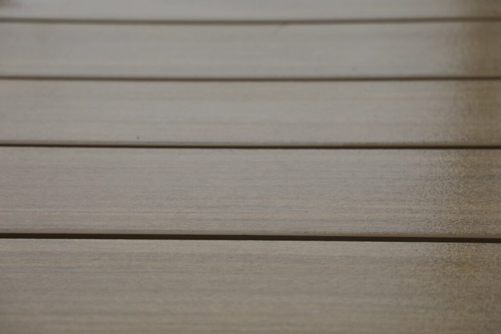 lake-windward-timbertech-deck-trespa-siding- Corner detail where Trespa siding meets TimberTech decking.