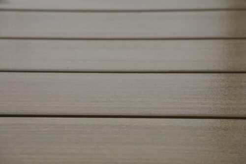 Corner detail where Trespa siding meets TimberTech decking.