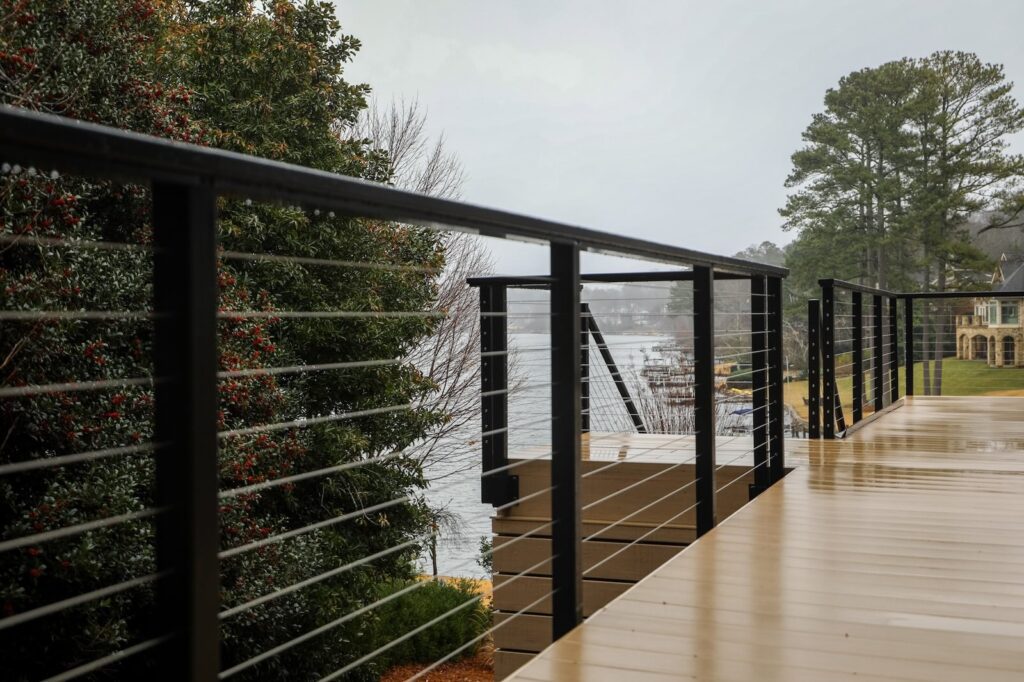 lake-windward-timbertech-deck-trespa-siding- Deck trim and border detail by Boyce Design + Build.