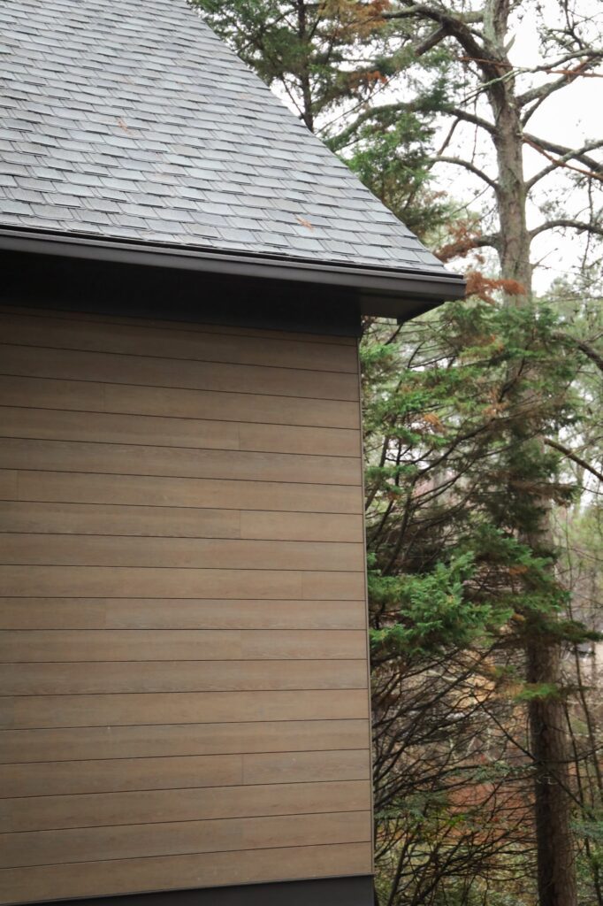 lake-windward-timbertech-deck-trespa-siding- Deck edge and picture-frame border detail on TimberTech boards.