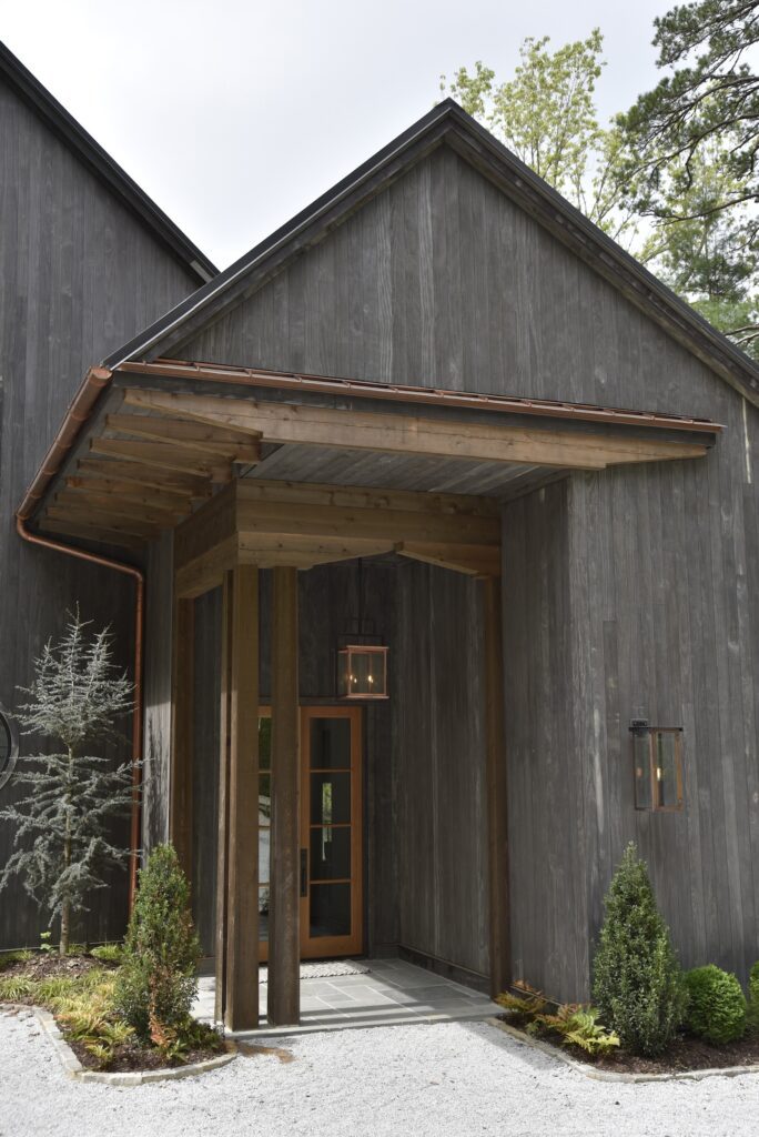 Accoya Grey siding showing detailed craftsmanship at the outdoor kitchen area.
