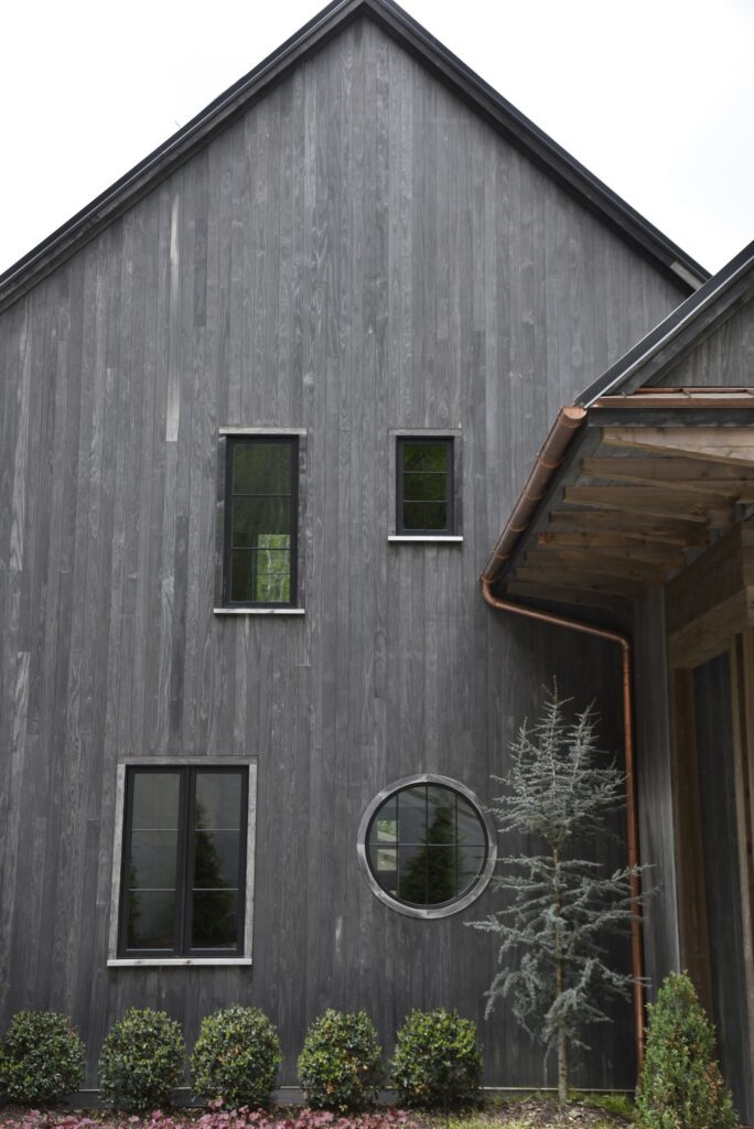 lakefront dock with clean vertical grain lines on the lakeside elevation.