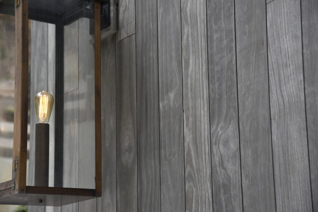 Accoya Grey soffits highlighting material texture along the waterfront deck.