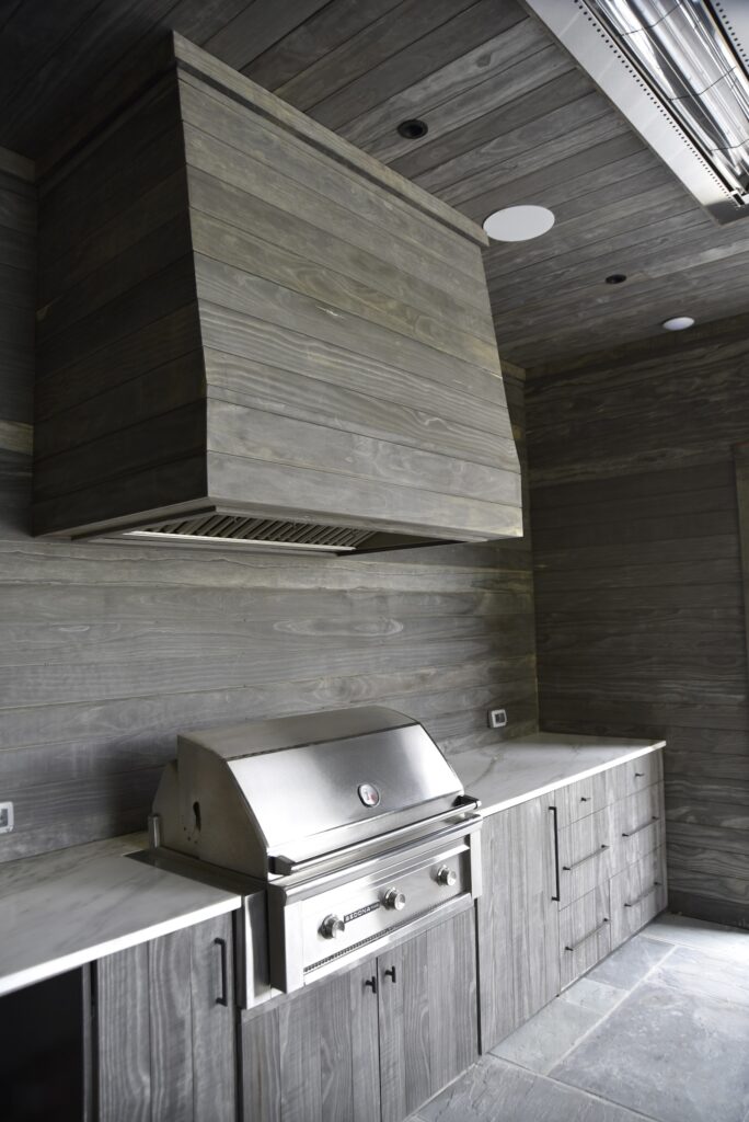Accoya Grey vent hood shown in natural light at the Lake Burton residence.