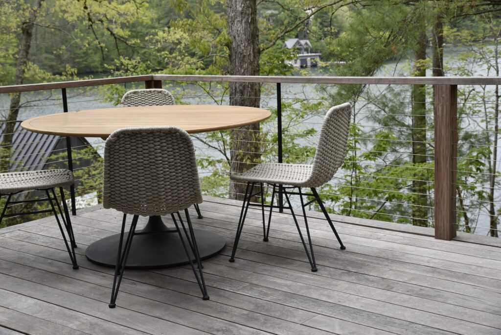 Accoya Grey cladding with modern black-framed windows at the outdoor kitchen area.