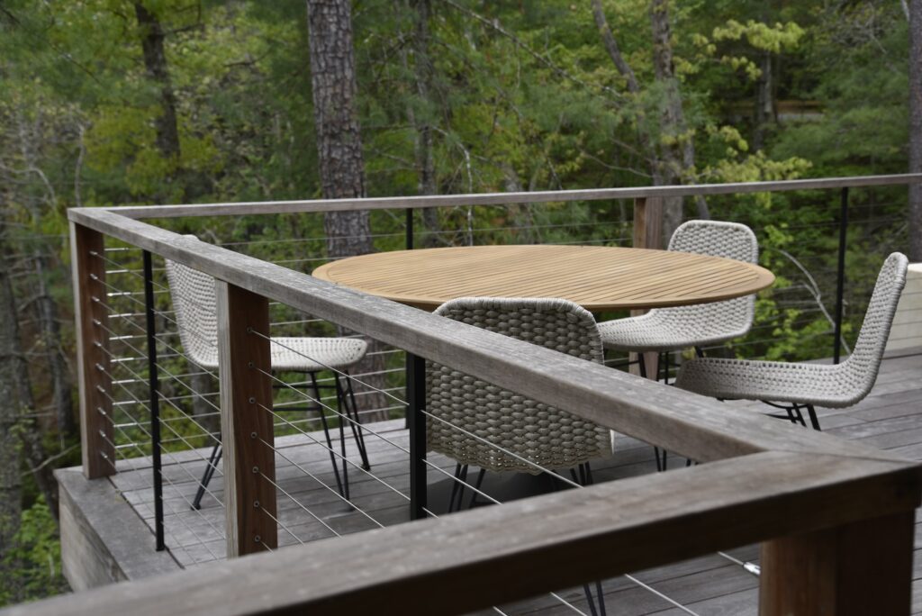 Ipe drink rail with refined architectural transitions beneath the roofline.