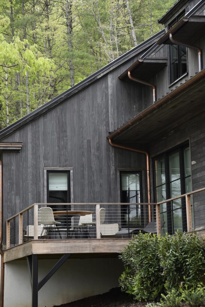 Accoya Grey soffits shown in natural light beneath the roofline.
