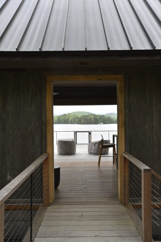 Accoya Grey cladding captured in a close-up view on the lakeside elevation.