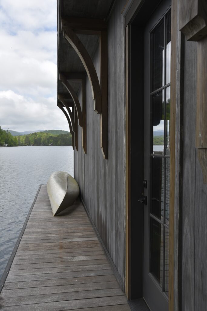 Accoya Grey soffits with refined architectural transitions at the home’s main façade.