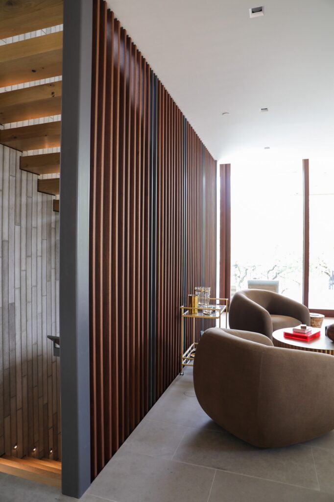 Garapa accent wall through stairwell