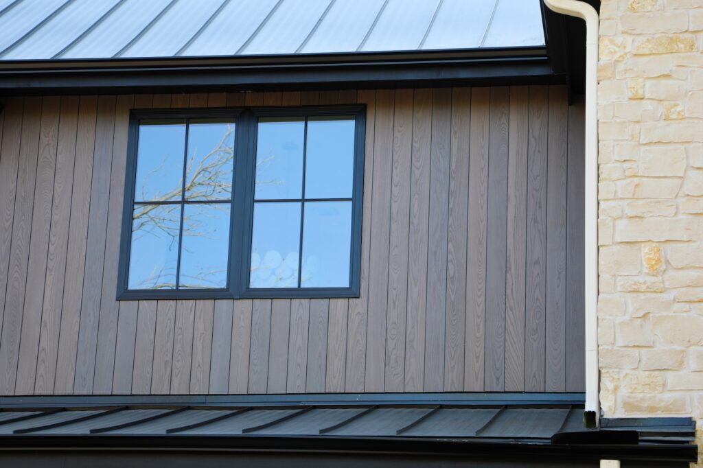 Vivid Silver thermally modified wood cladding paired with minimalist design elements integrated into the architectural envelope.