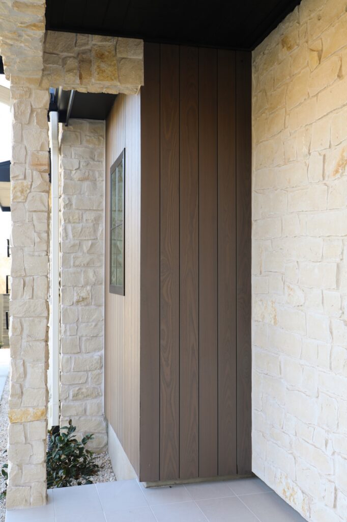 Thermally modified ash siding in Vivid Silver finish with seamless board alignment on a custom Austin home exterior.