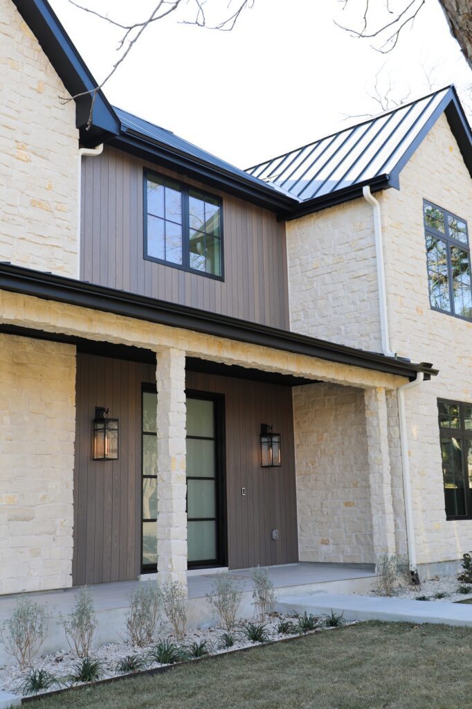 Thermory Benchmark Ash Vivid Silver cladding framing the contemporary exterior on the exterior wall plane.