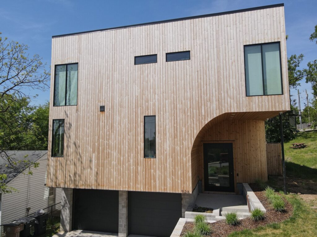 Thermory knotty pine exterior cladding on modern home in East Nashville