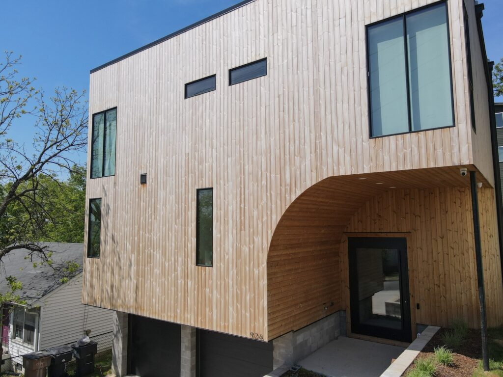 Modern Nashville home with Thermory knotty pine wood siding and soffit