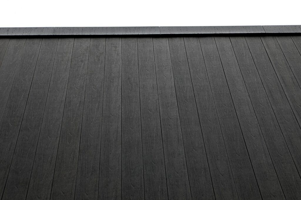 Denmark Library’s 5th Branch features approximately 10,000 square feet of NewTechWood All Weather Siding in Hawaiian Charcoal across exterior cladding, trim, and interior ceiling applications. The project blends sustainable material selection with modern civic architecture, creating a durable, low-maintenance building designed to stay connected to the surrounding landscape.