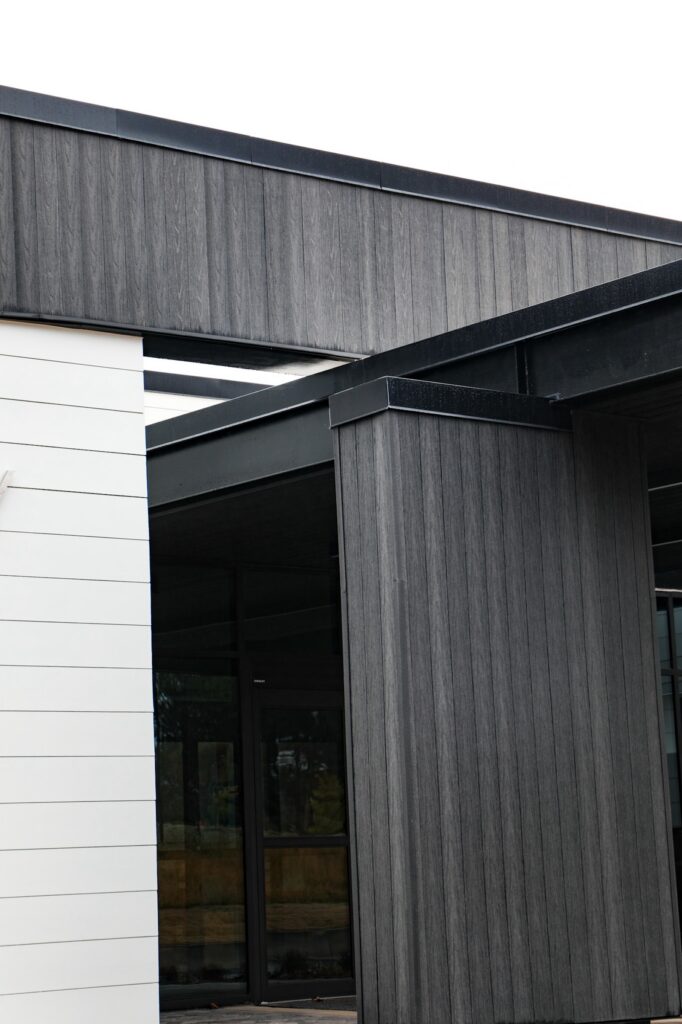 Denmark Library’s 5th Branch features approximately 10,000 square feet of NewTechWood All Weather Siding in Hawaiian Charcoal across exterior cladding, trim, and interior ceiling applications. The project blends sustainable material selection with modern civic architecture, creating a durable, low-maintenance building designed to stay connected to the surrounding landscape.
