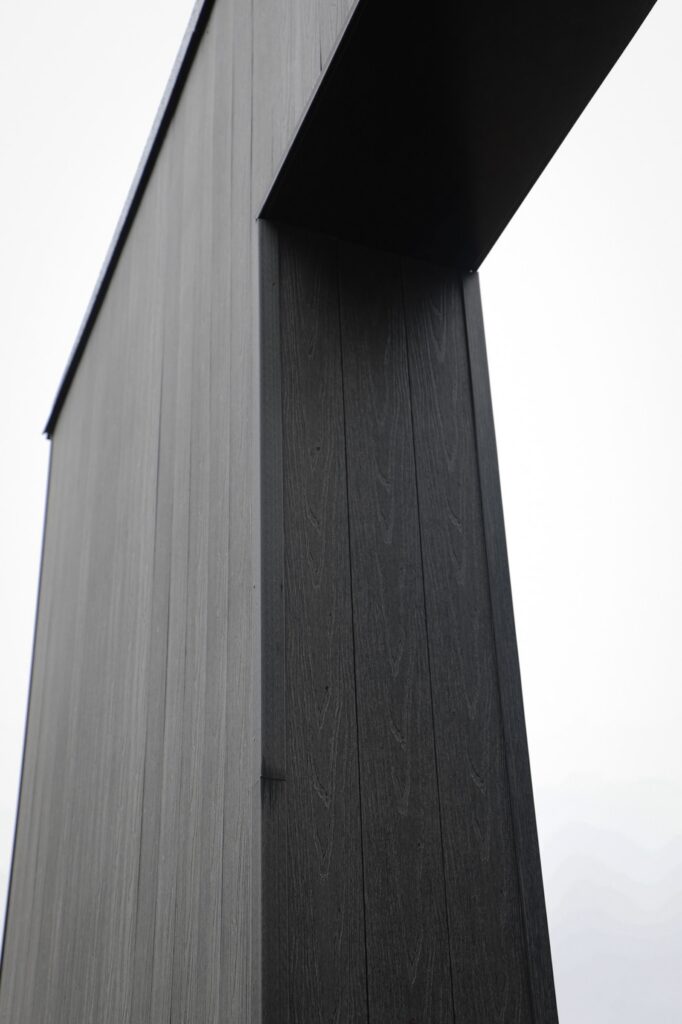 Denmark Library’s 5th Branch features approximately 10,000 square feet of NewTechWood All Weather Siding in Hawaiian Charcoal across exterior cladding, trim, and interior ceiling applications. The project blends sustainable material selection with modern civic architecture, creating a durable, low-maintenance building designed to stay connected to the surrounding landscape.