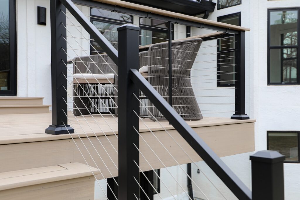 TimberTech deck stairs leading toward Lake Austin shoreline