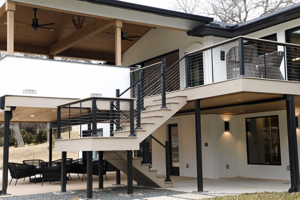 Cable railing and TimberTech decking at waterfront home