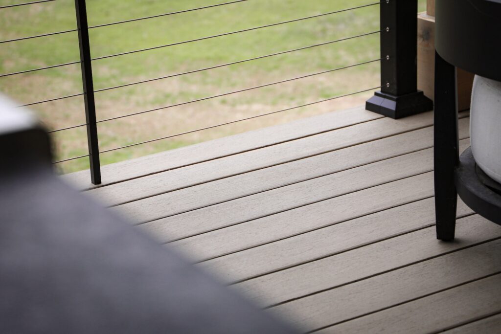 Outdoor gathering space with TimberTech decking and cable railing