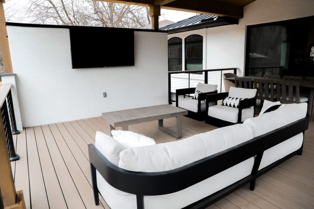 TimberTech decking paired with cedar soffits at Lake Austin home