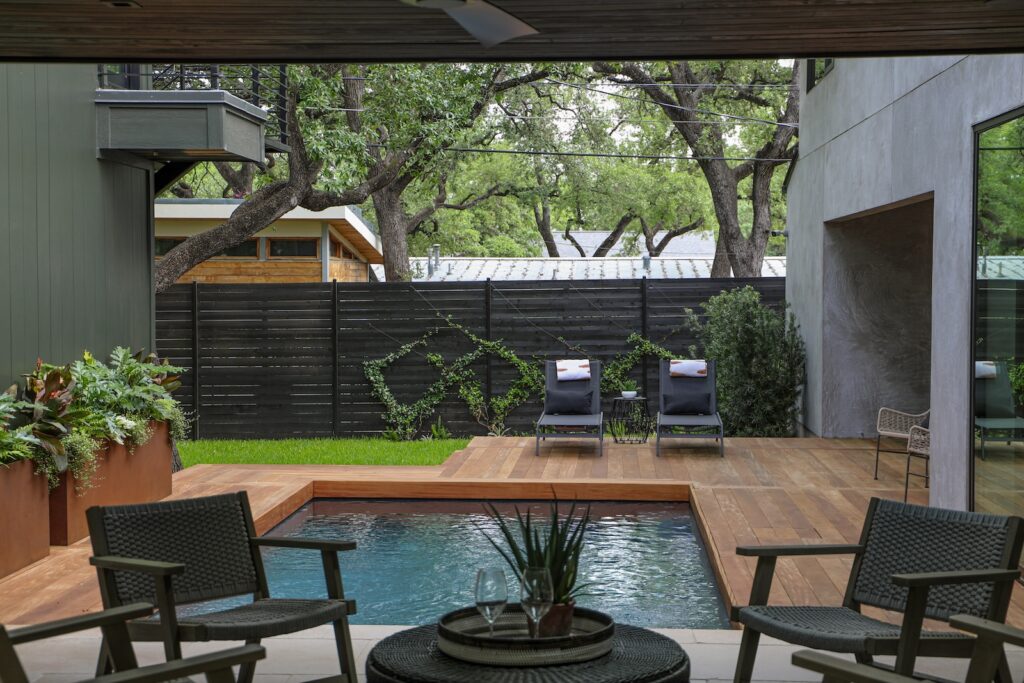 Contemporary Austin home with natural Garapa hardwood pool deck