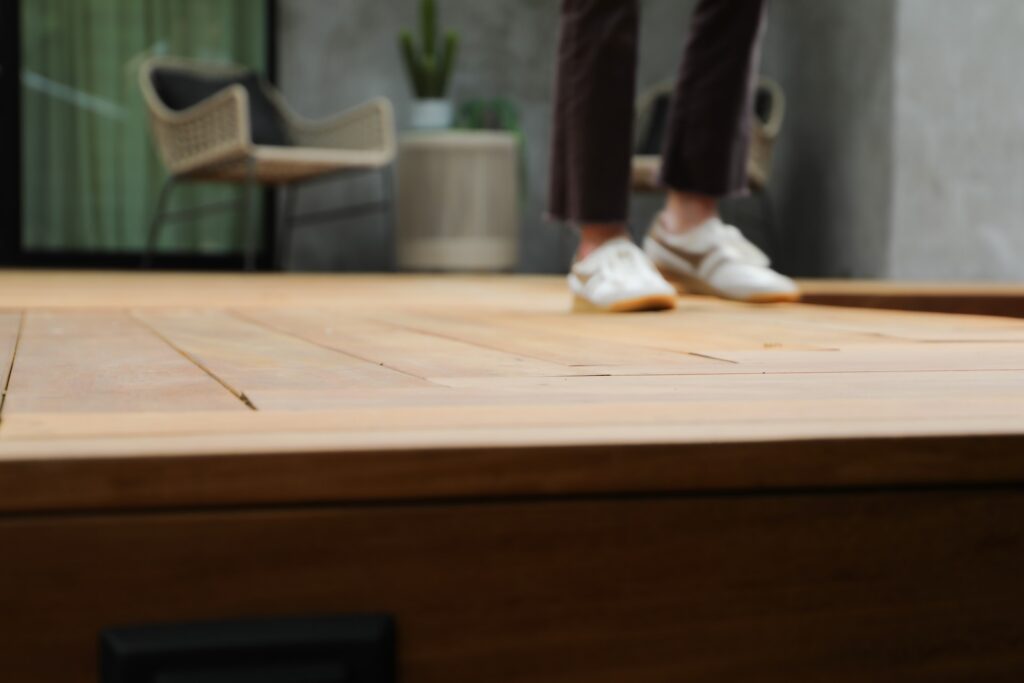 Detailed view of custom Garapa decking boards around a swimming pool