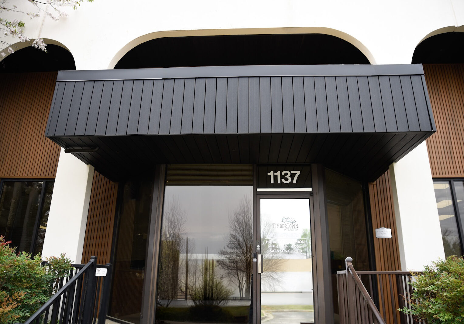 NewTechWood black soffit boards wrapping canopy at TimberTown Atlanta