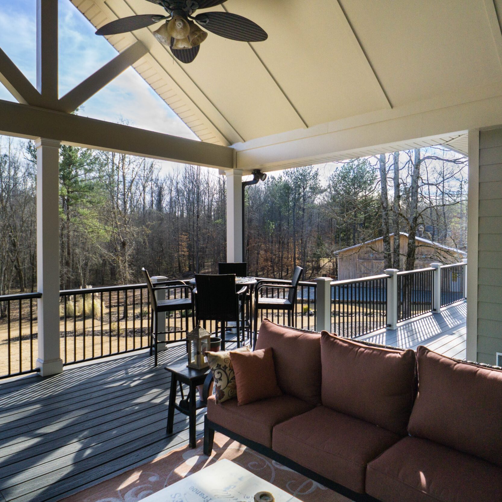 Custom home showcasing Trex composite decking and Ply Gem PVC trim details