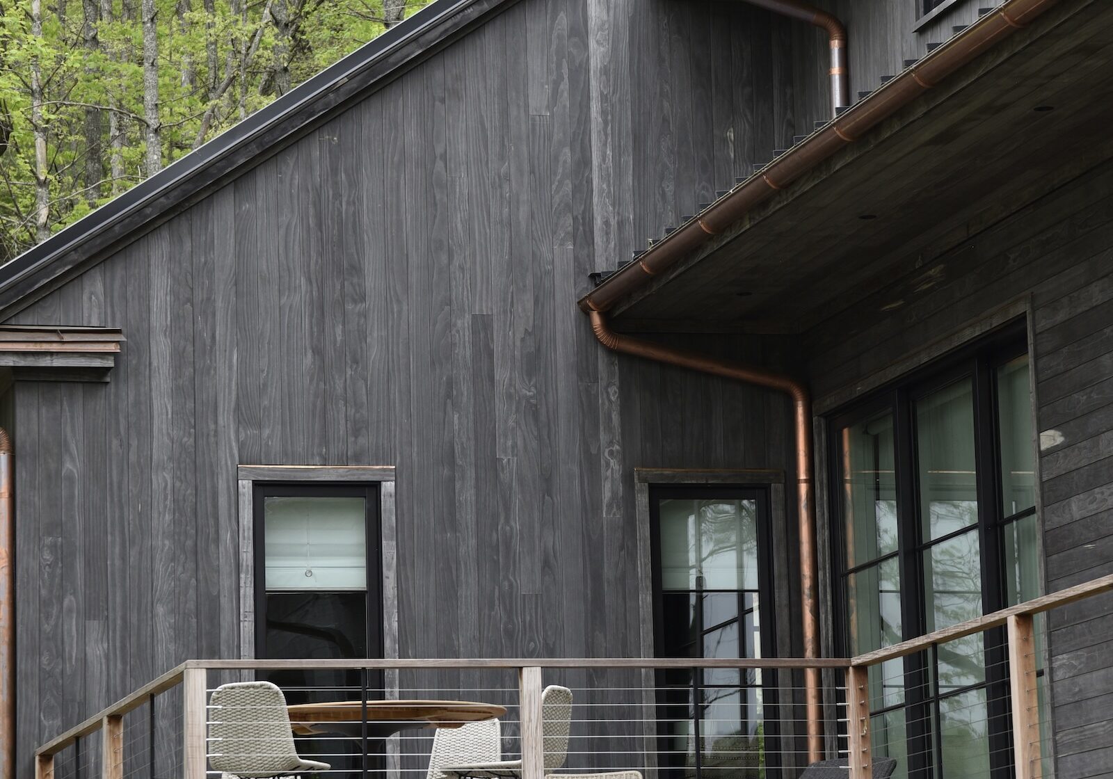 Accoya Grey soffits shown in natural light beneath the roofline.