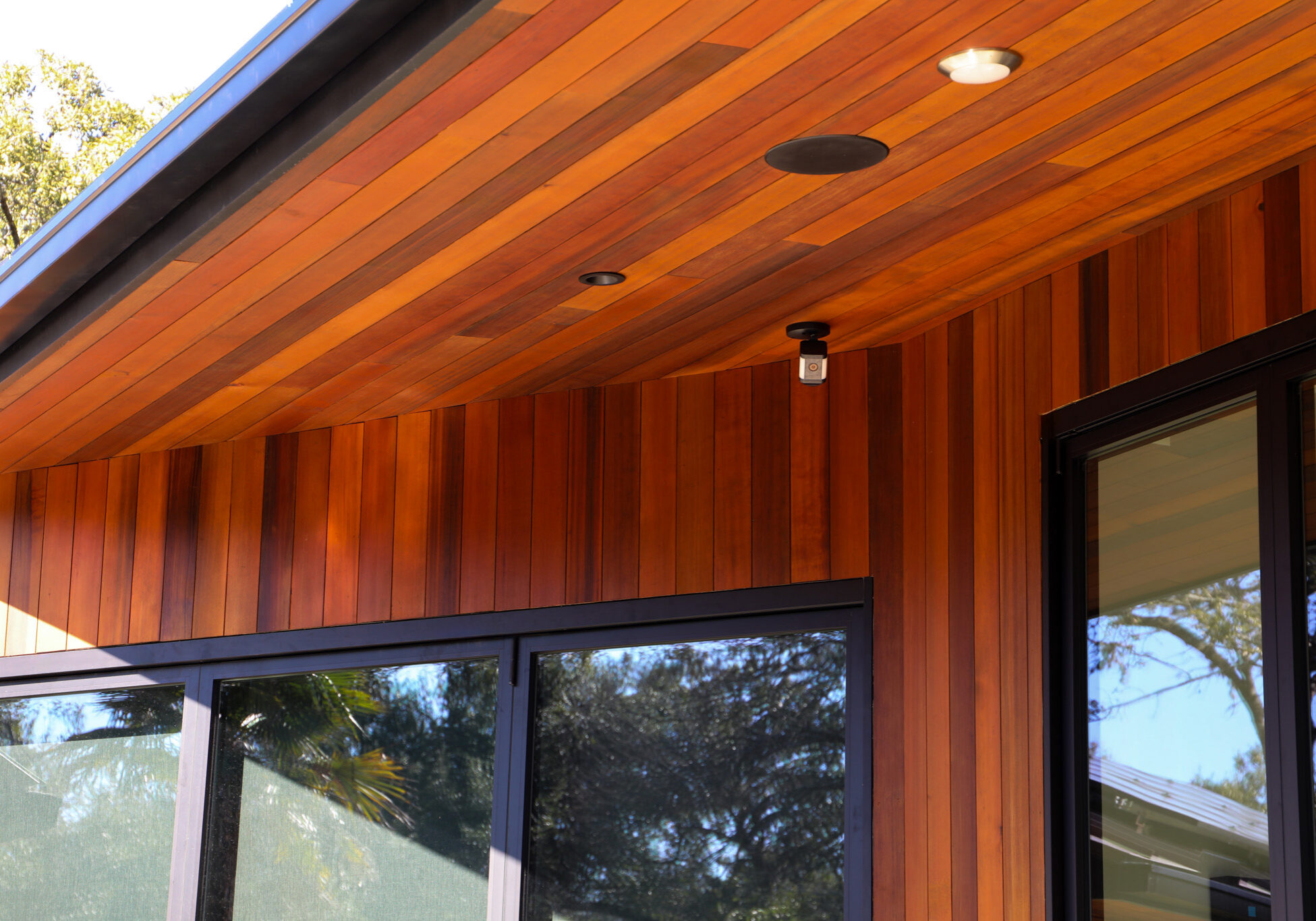Close-up of Rainier Plank soffit and siding with Cutek finish in Austin Texas