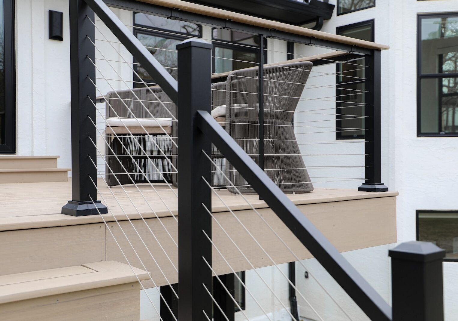 TimberTech deck stairs leading toward Lake Austin shoreline